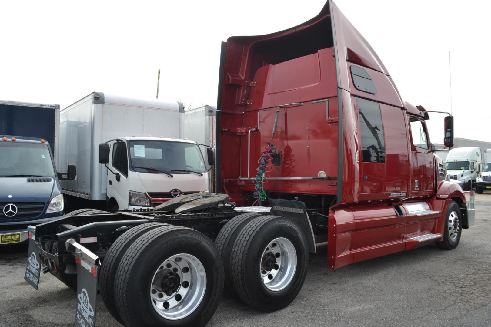 2018 MAROON WESTERN STAR 5700XE with an DETROIT DD15 14.8L 455HP engine, DETROIT DT12 AUTOMATED transmission, located at 9172 North Fwy, Houston, TX, 77037, (713) 910-6868, 29.887470, -95.411903 - 82" RAISED ROOF SLEEPER, RATIO: 2.41, RATIO: 2.41, 5TH WHEEL SLIDE, DIFF LOCK, 100 GALLON FUEL TANKS, MINI FRIDGE, ALUMINUM WHEELS - Photo#4