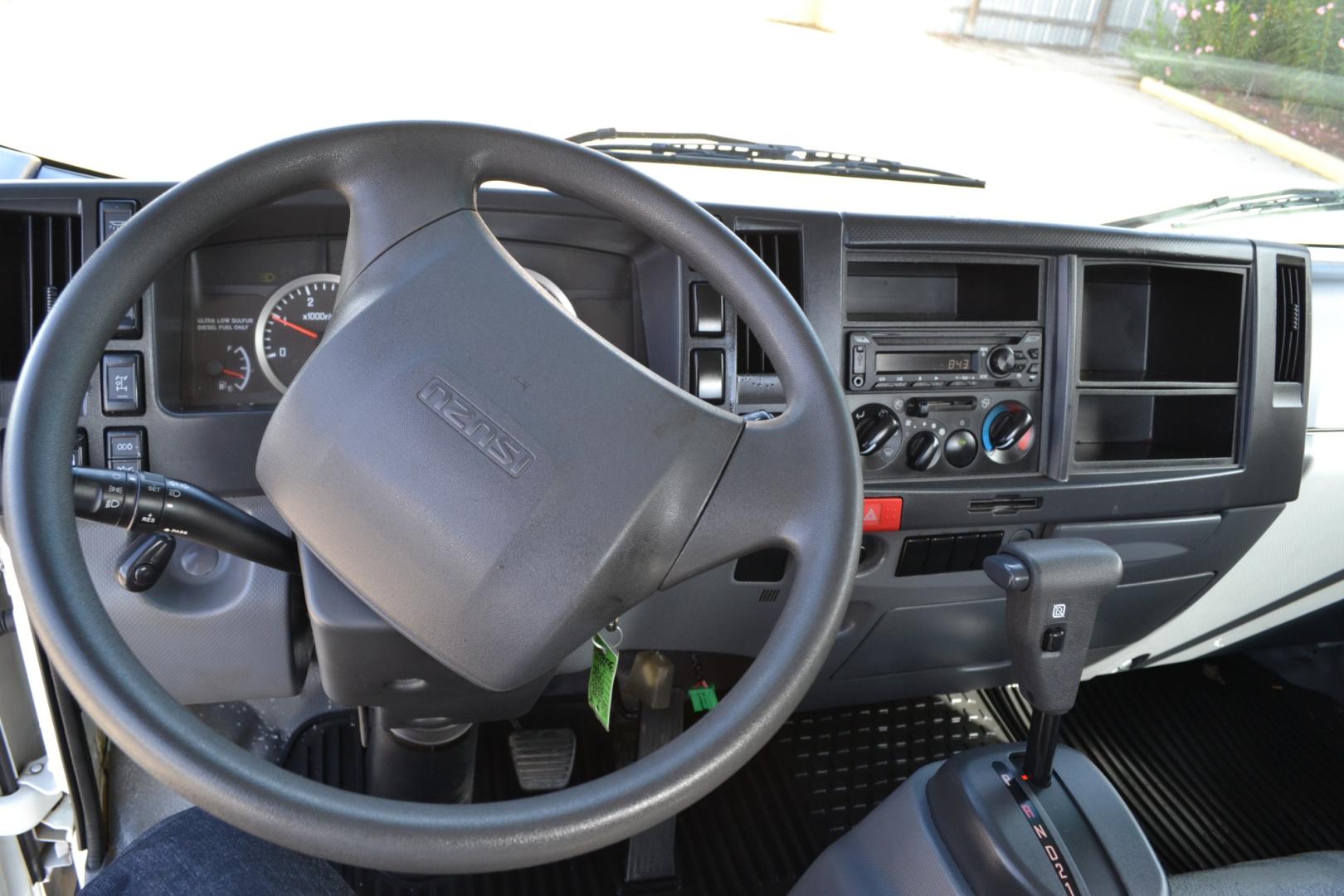 2020 WHITE ISUZU NRR with an 4HK1TC 5.2L TURBO-CHARGED DIESEL engine, AUTOMATIC transmission, located at 9172 North Fwy, Houston, TX, 77037, (713) 910-6868, 29.887470, -95.411903 - COTTRELL 1 CARRB SINGLE CAR HAULER, RAMSEY 8,000LB WINCH, 19,500LB GVWR, TOOL BOX, EXHAUST BRAKE, TOW LIGHT BAR, HEATED MIRRORS, POWER WINDOWS & LOCKS, CRUISE CONTROL - Photo#16