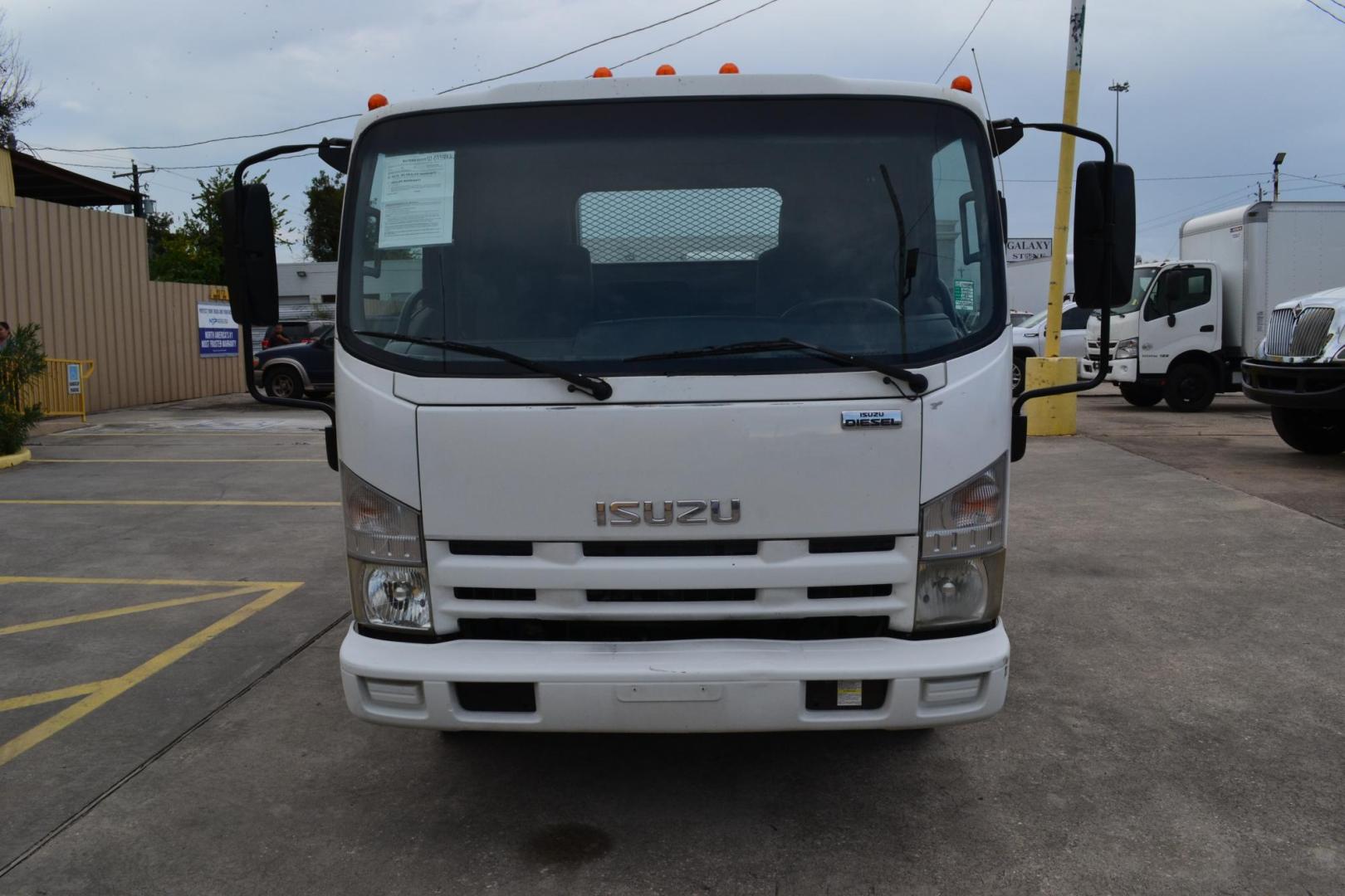 2012 WHITE /GRAY ISUZU NPR with an 4HK1TC 5.2L TURBO-CHARGED DIESEL engine, AUTOMATIC transmission, located at 9172 North Fwy, Houston, TX, 77037, (713) 910-6868, 29.887470, -95.411903 - Photo#1