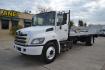 2019 WHITE /BLACK HINO 268 with an JO8E-VB 8.0L 260HP engine, ALLISON 2500RDS AUTOMATIC transmission, located at 9172 North Fwy, Houston, TX, 77037, (713) 910-6868, 29.887470, -95.411903 - 25,950 LB GVWR NON CDL, 24 FT FLATBED, 100" WIDE, AIR RIDE SUSPENSION, EXHAUST BRAKE, 90 GALLON FUEL TANK, POWER WINDOWS, LOCKS, & MIRRORS - Photo#0