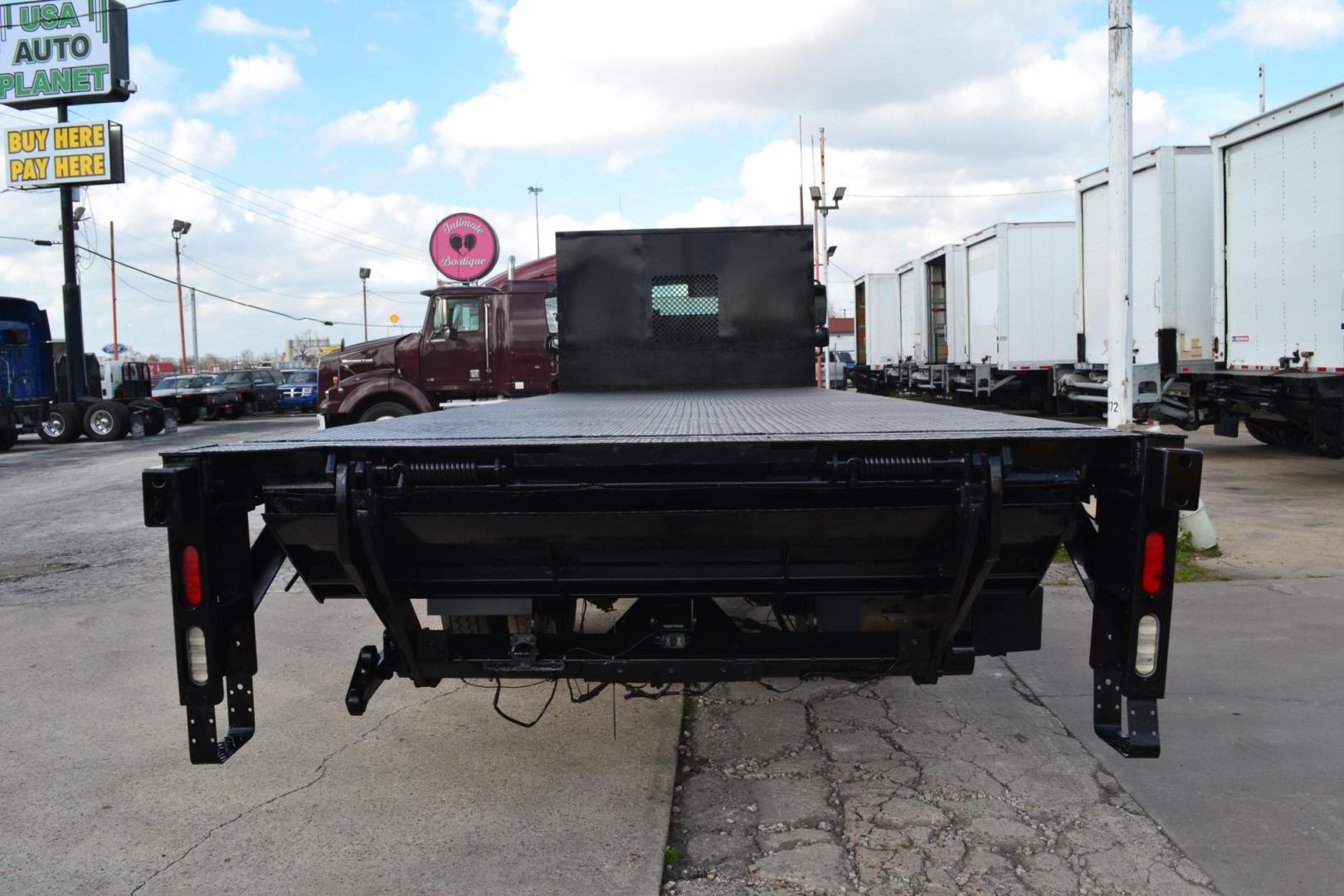 2016 BLACK /BLACK FREIGHTLINER M2-106 (3ALACWDT0GD) with an CUMMINS B6.7L 240HP engine, ALLISON 2500RDS AUTOMATIC transmission, located at 9172 North Fwy, Houston, TX, 77037, (713) 910-6868, 29.887470, -95.411903 - 26,000 LB GVWR NON CDL, 24 FT FLATBED X 100" WIDE, SPRING RIDE SUSPENSION, 100 GALLON FUEL TANK, 2,500 LB CAPACITY STEEL LIFT GATE, WB: 255", 7 X SLIDING WINCH STRAPS, , 2 X TOOL BOXES, POWER WINDOWS & LOCKS - Photo#4